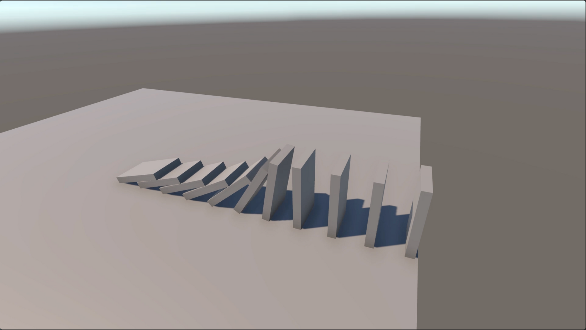 3D art of a domino fall in progress.